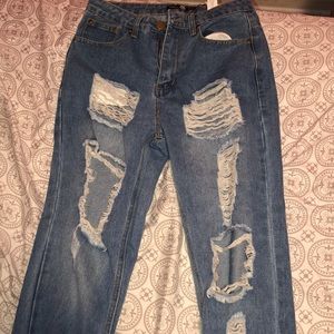 light wash mom jeans with holes